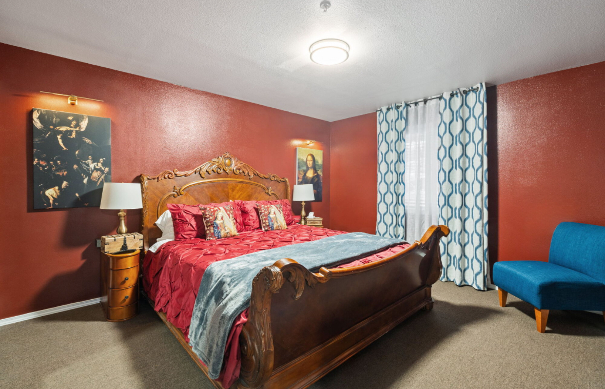 Phantom of the Opera dramatic king room with crimson walls at LibraryInn, Lava Hot Springs Idaho
